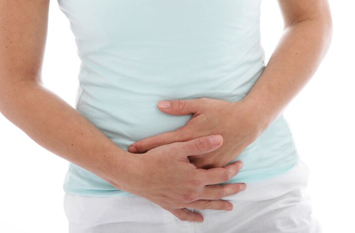 One of the signs of cystitis in a woman is a dull pain in the lower abdomen